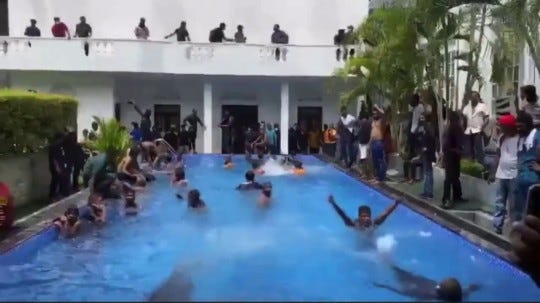 Image result from https://metro.co.uk/2022/07/09/protesters-storm-home-of-sri-lankan-president-as-nation-goes-bankrupt-16970887/?ico=amp_tag-post-strip_item_3_news