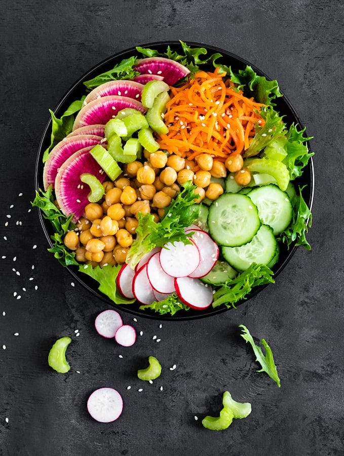 Buddha Bowl With Fresh Cucumber, Celery, Watermelon Radish, Raw Carrot, Lettuce, Red Radish