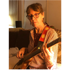 A person playing a guitar

AI-generated content may be incorrect.