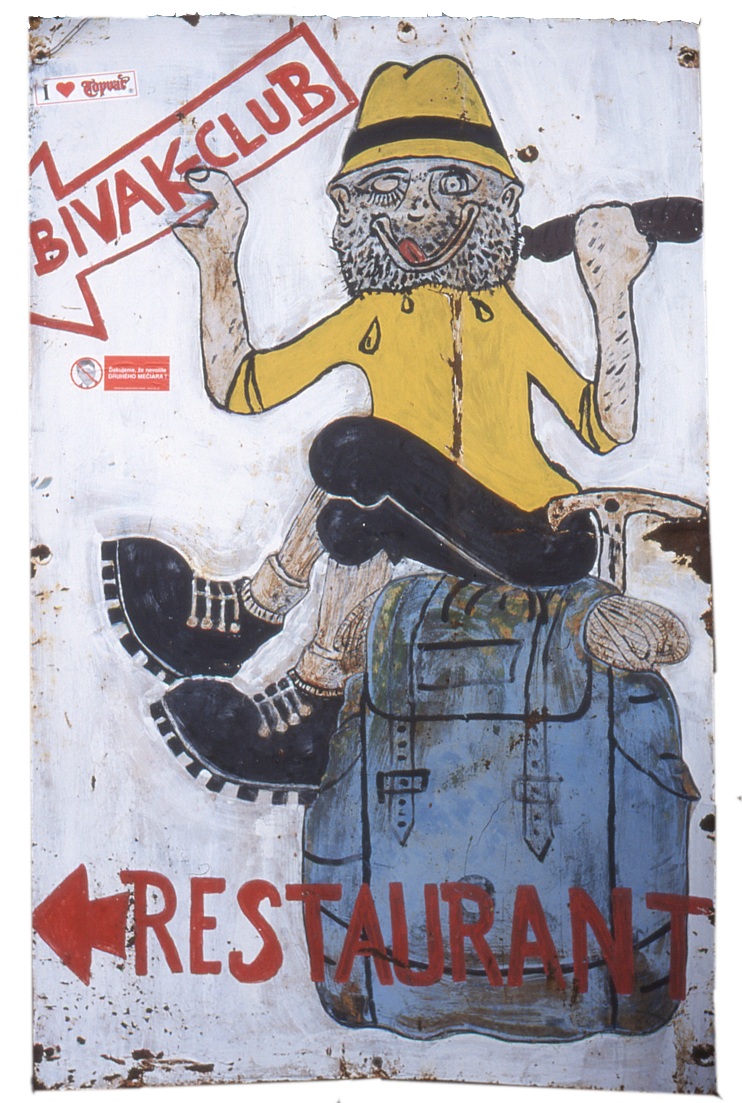 scruffy mountaineer eating a sausage in Slovakia