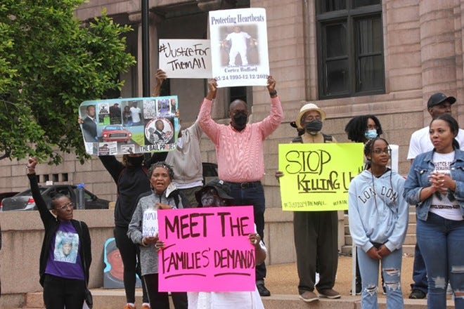Families stood in front of City Hall and yelled "We fight for you!" after victims' names were called. - MONICA OBRADOVIC Families stood in front of City Hall and yelled "We fight for you!" after victims' names were called. - MONICA OBRADOVIC