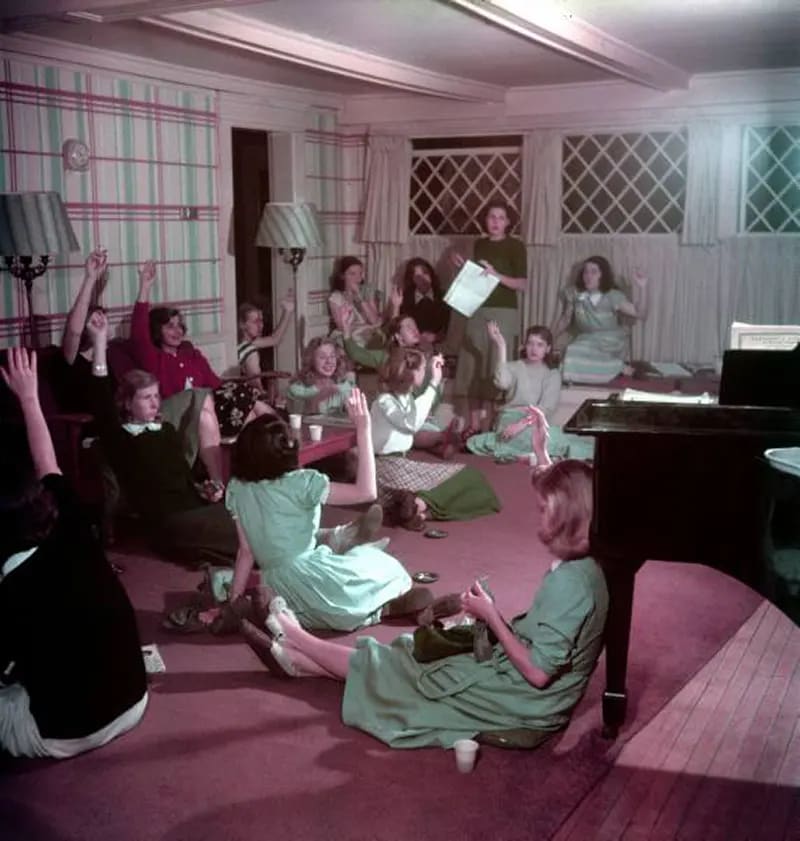 Female students gathered on the beautiful Smith College campus, embodying the spirit of higher education in 1948. Female students gathered on the beautiful Smith College campus, embodying the spirit of higher education in 1948.