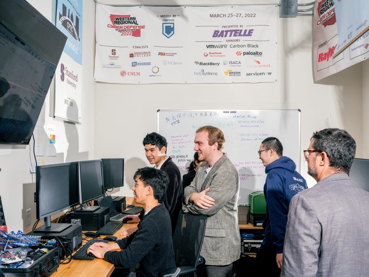 The Trinity Research team in a computer lab.