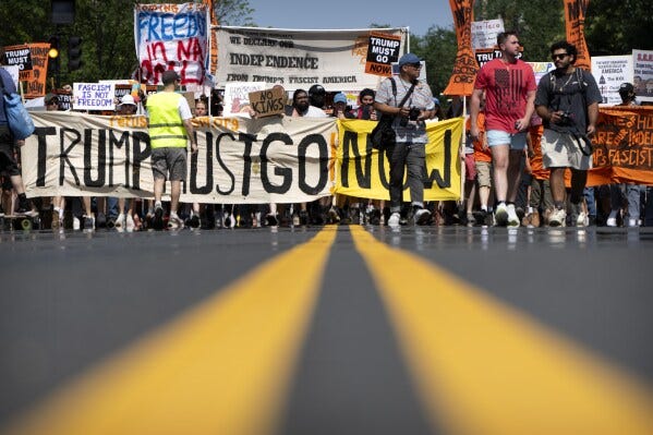 Demonstrators protesting against President Donald Trump and his policies march toward the White House on Friday, July 4, 2025, in Washington. (AP Photo/Mark Schiefelbein) Demonstrators protesting against President Donald Trump and his policies march toward the White House on Friday, July 4, 2025, in Washington. (AP Photo/Mark Schiefelbein)