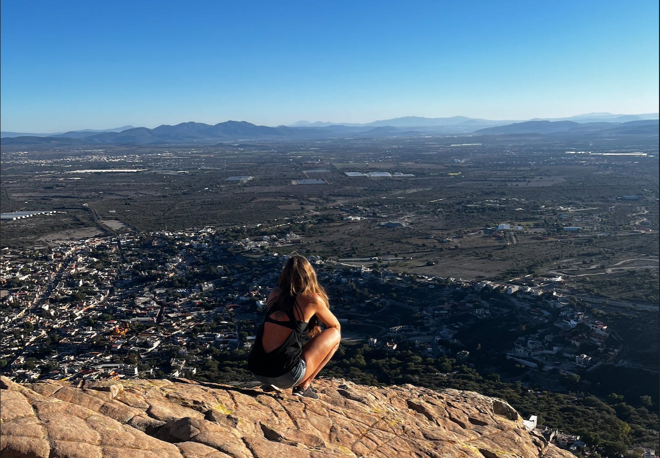 Jara on the Peña de Bernal overlooking the town