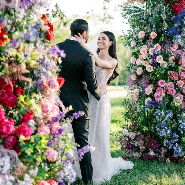 Bride Puts Her Hands on Groom's Face During Wedding Ceremony Bride Puts Her Hands on Groom's Face During Wedding Ceremony