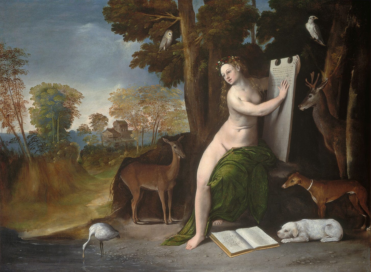 A nearly nude young woman with flowers in her blond hair sits under a tree holding a tall inscribed stone tablet, surrounded by a doe, dogs, a stag, an owl, a hawk and a spoonbill, with an open book of diagrams at her feet.