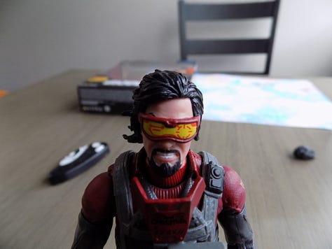 Pictures of the figure each a different head shown off