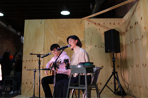 Attendees and artists at Ka Yee Chan's event, Hungry.