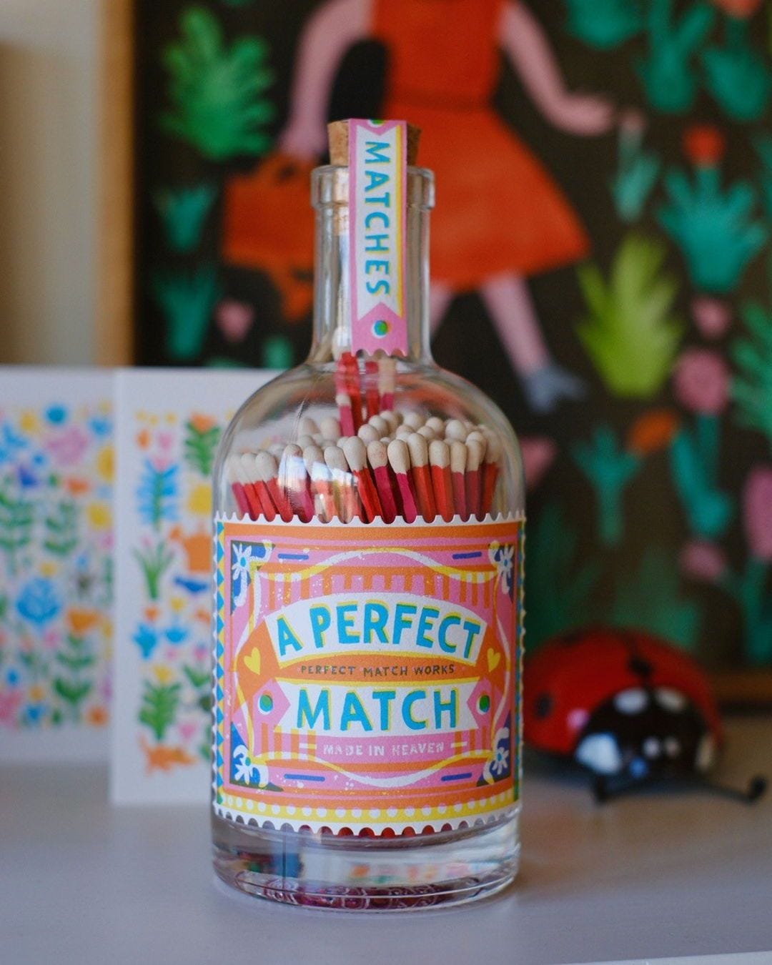 The Archivist’s matchbox bottle with The Printed Peanut design
