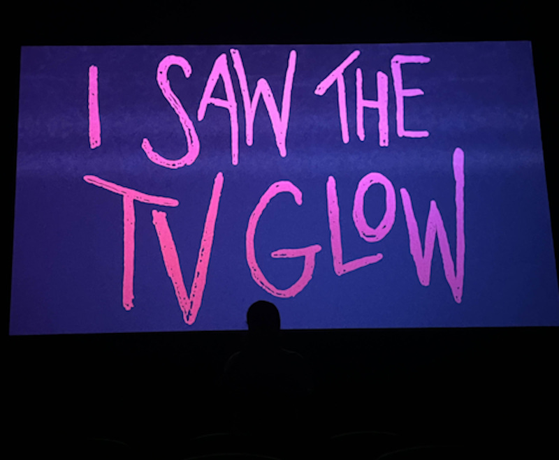 Photo of me in front of "I Saw The TV Glow" Photo of me in front of "I Saw The TV Glow"