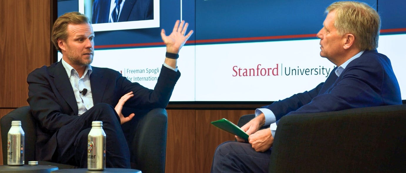 A person raising his hand to answer a question

AI-generated content may be incorrect.