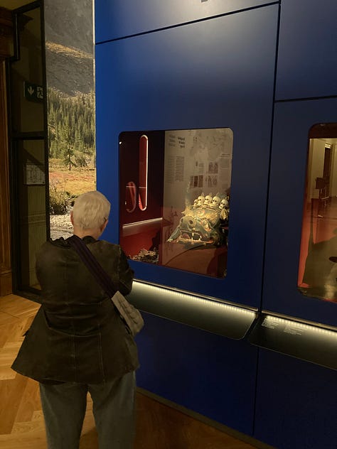 Pictures of a ceramic camel, a pizza, the seal of a General, a Garuda mask, a yurt, a lovely lady looking at a Yama, a map, and a timeline.