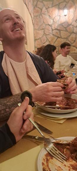 A person eating at a table
Description automatically generated A person eating at a table
Description automatically generated