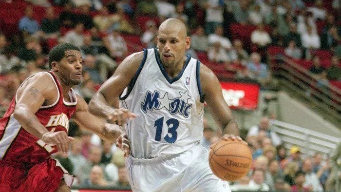 A basketball player dribbling a basketball

AI-generated content may be incorrect.