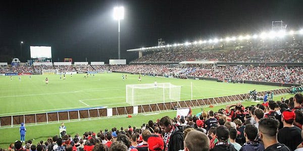 The crowd at a football match at Parramatta Stadium