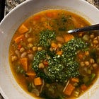 Miso tomato brothy beans & orzo with feta green sauce