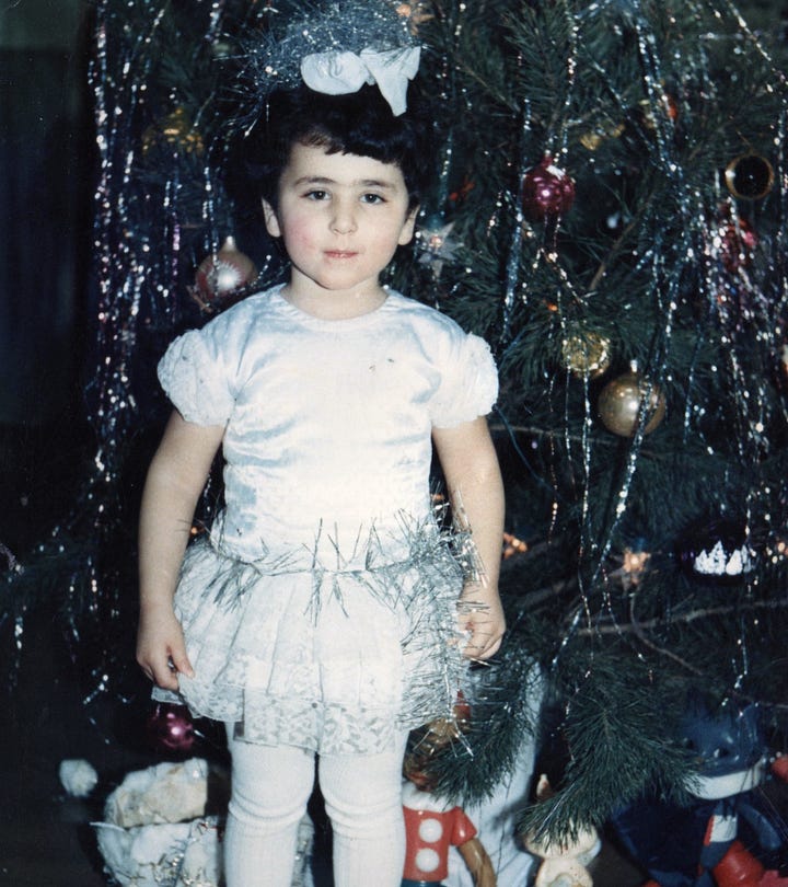 Left: Me with New Year yolka, Odessa, Ukraine, circa 1987. Right: Me with 3-year-old daughter, NYC, December 2023.