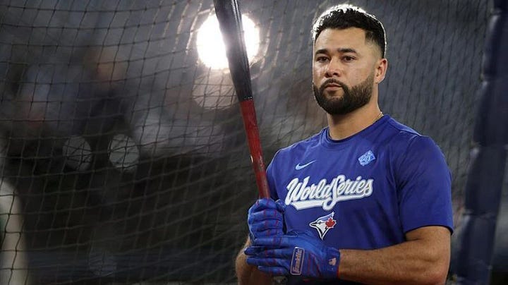 Isaiah Kiner Falefa freshly shaven in a white teeshirt, and then recently in Toronto with glorious hair and beard.