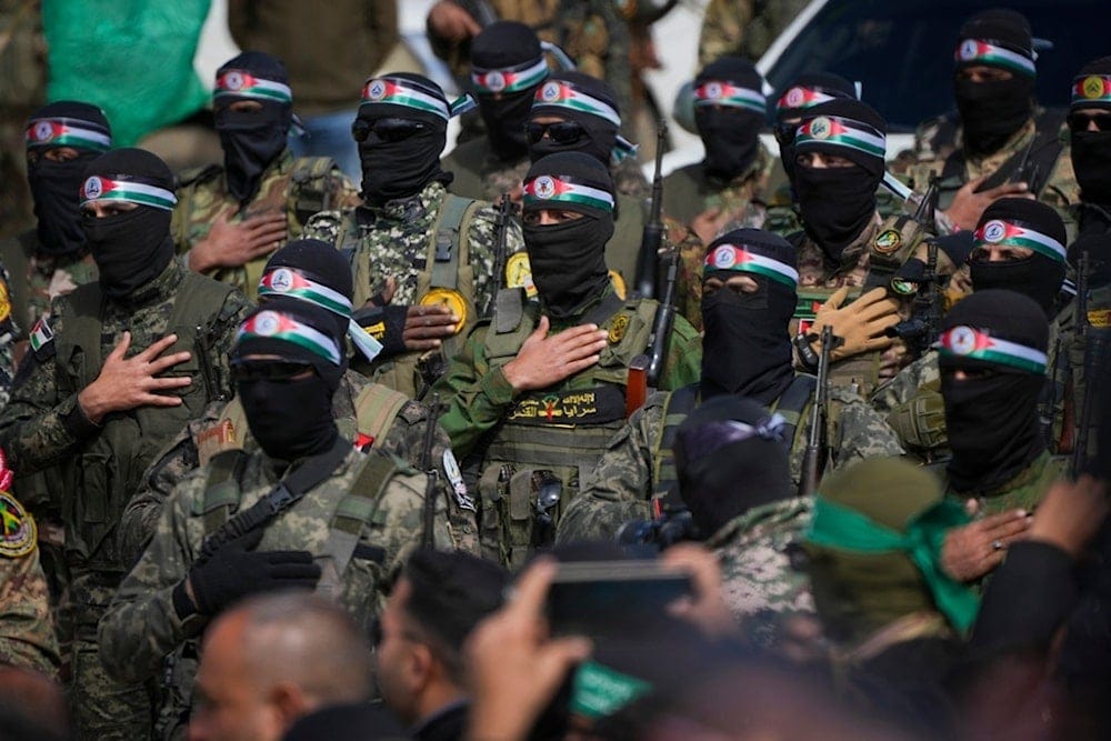 Hamas fighters stand in formation ahead of a ceremony to hand over Israeli captives to the Red Cross in Nuseirat, Gaza Strip, Feb. 22, 2025. (AP Photo/Abdel Kareem Hana, File) Hamas fighters stand in formation ahead of a ceremony to hand over Israeli captives to the Red Cross in Nuseirat, Gaza Strip, Feb. 22, 2025. (AP Photo/Abdel Kareem Hana, File)