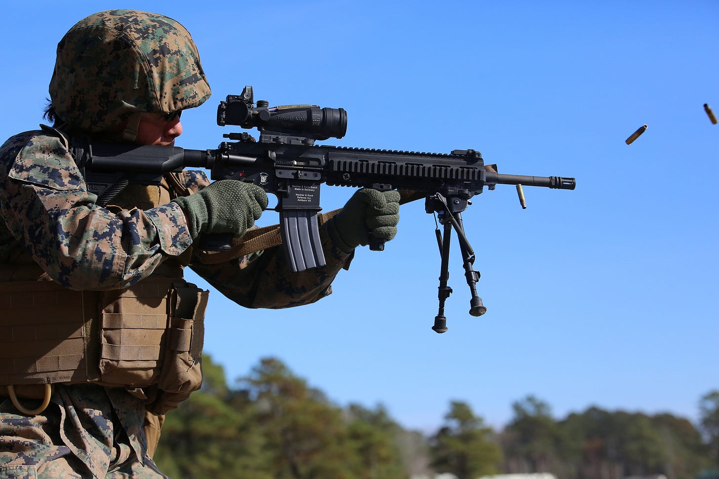 Sgt. Margarita B. Valenzuela, automatic rifleman with 2nd Platoon, Company A, Ground Combat Element Integrated Task Force, engages known-distance targets with the M27 Infantry Automatic Rifle from the standing position during a three-day field exercise at the Verona Loop training area on Marine Corps Base Camp Lejeune, North Carolina, Dec. 3, 2014. (U.S. Marine Corps photo by Sgt. Alicia R. Leaders/Released)