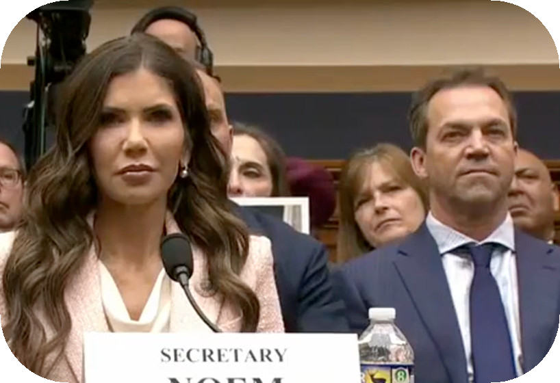 Here we see the American Cuck (Mr. Noem) sitting obediently back and to the left of his wife, Kristi, as she is asked during a Congressional Hearing whether or not she does the sexy times with Corey Lewandowski
