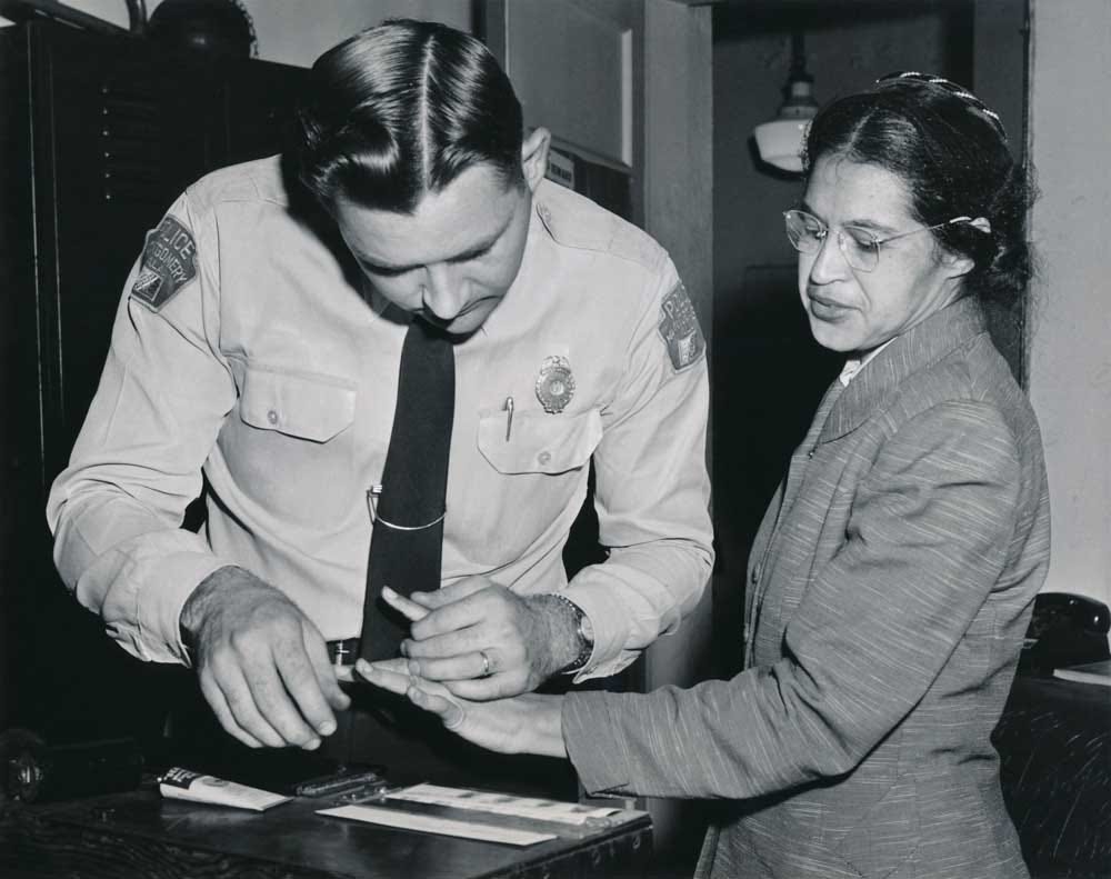 Rosa Parks being fingerprinted on February 22, 1956, by Deputy Sheriff D.H. Lackey as one of the people indicted as leaders of the Montgomery bus boycott. Rosa Parks being fingerprinted on February 22, 1956, by Deputy Sheriff D.H. Lackey as one of the people indicted as leaders of the Montgomery bus boycott.