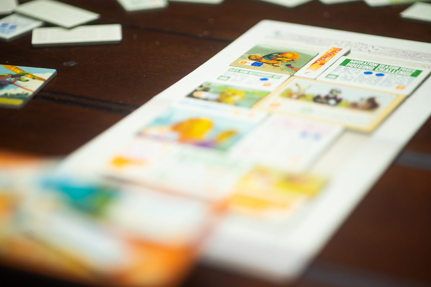 A player board in the board game Fit to Print, with tiles placed and aligned on it.
