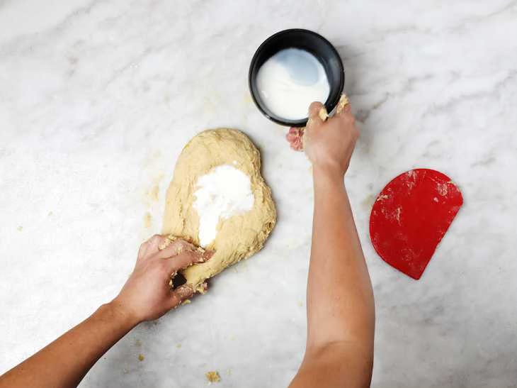 Adding milk to dry dough