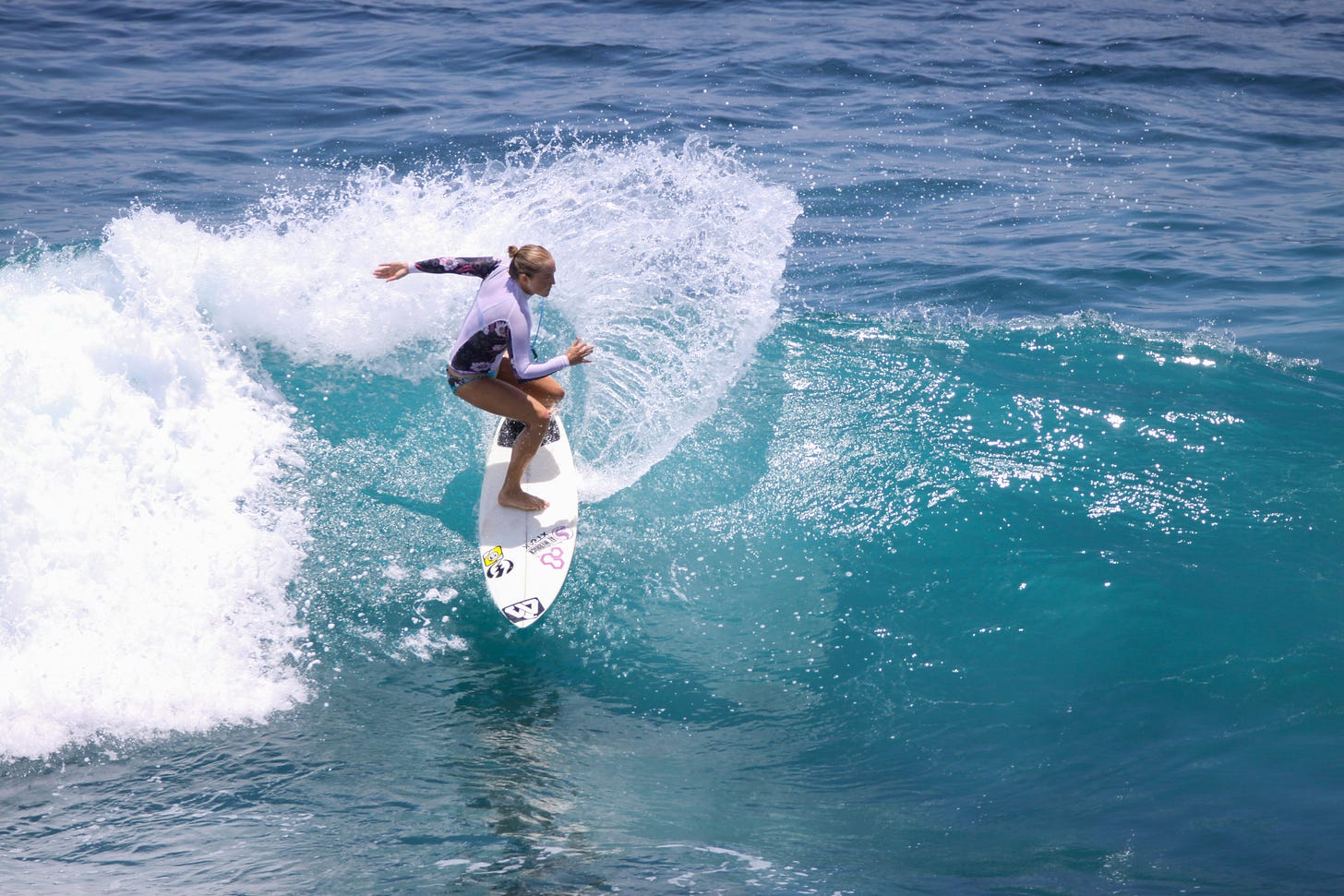 woman surfing big wave ocean