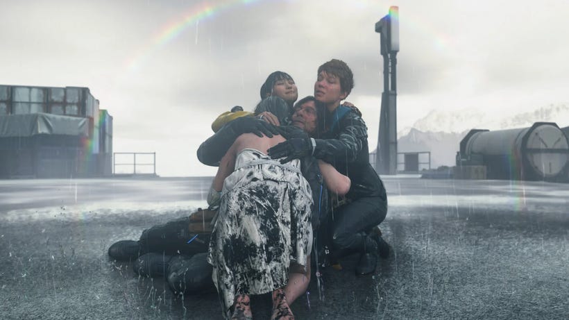 The case of Death Stranding 2 hugs in the rain beneath a rainbow