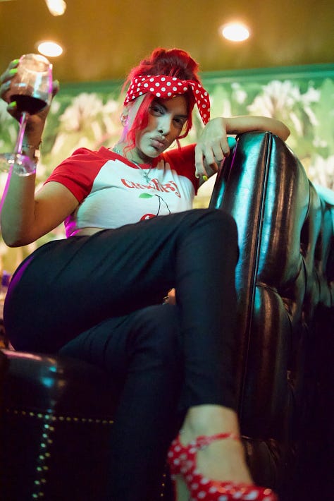 Candid street-style photograph capturing a person’s outfit in an urban setting, highlighting natural textures, layered clothing, and understated personal style as observed in everyday city life.