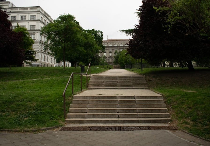a set of steps leading up to a building a set of steps leading up to a building