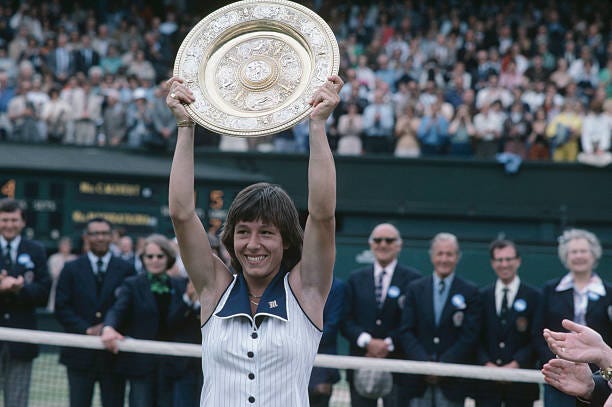 Czech born American tennis player Martina Navratilova pictured raising the Venus Rosewater Dish trophy in the air after defeating Chris Evert to win...