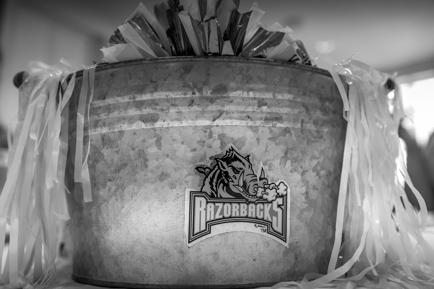 Razorbacks ice bucket filled with pom poms Razorbacks ice bucket filled with pom poms