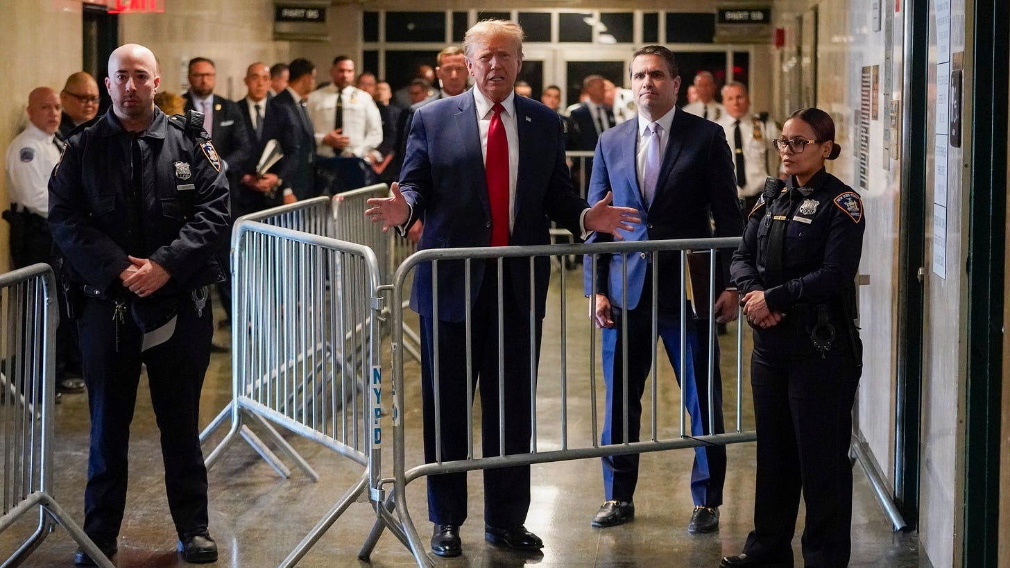 Former President Donald Trump speaks to reporters after leaving Manhattan criminal court, Thursday, Feb. 15, 2024, in New York. A New York judge says Trump's hush-money trial will go ahead as scheduled with jury selection starting on March 25. (AP Photo/Mary Altaffer)