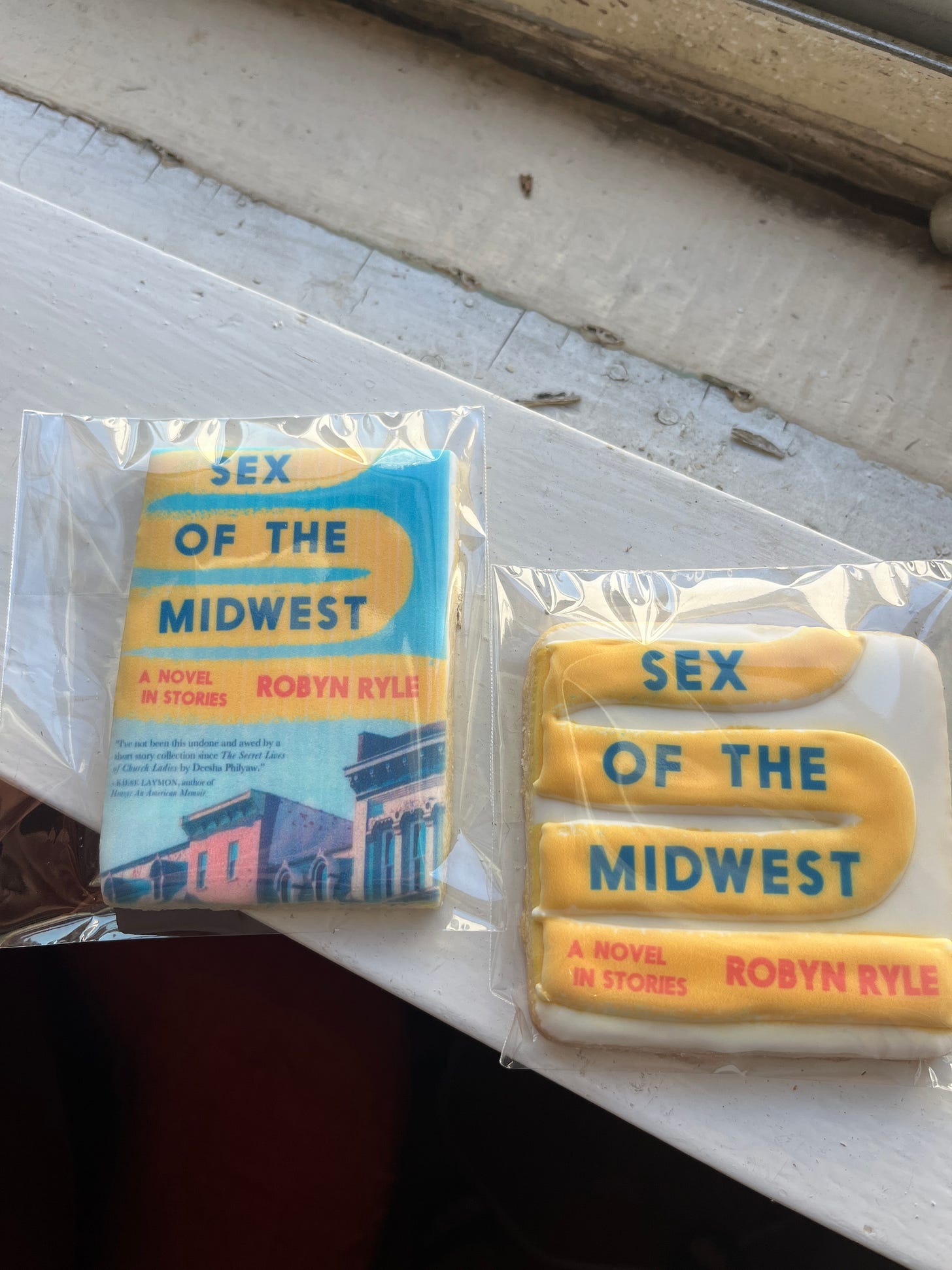 Two cookies with images from the cover of SEX OF THE MIDWEST