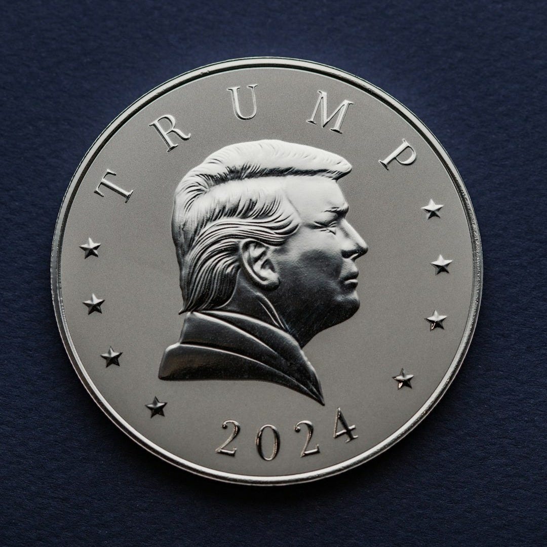 a close up of a coin with a president on it