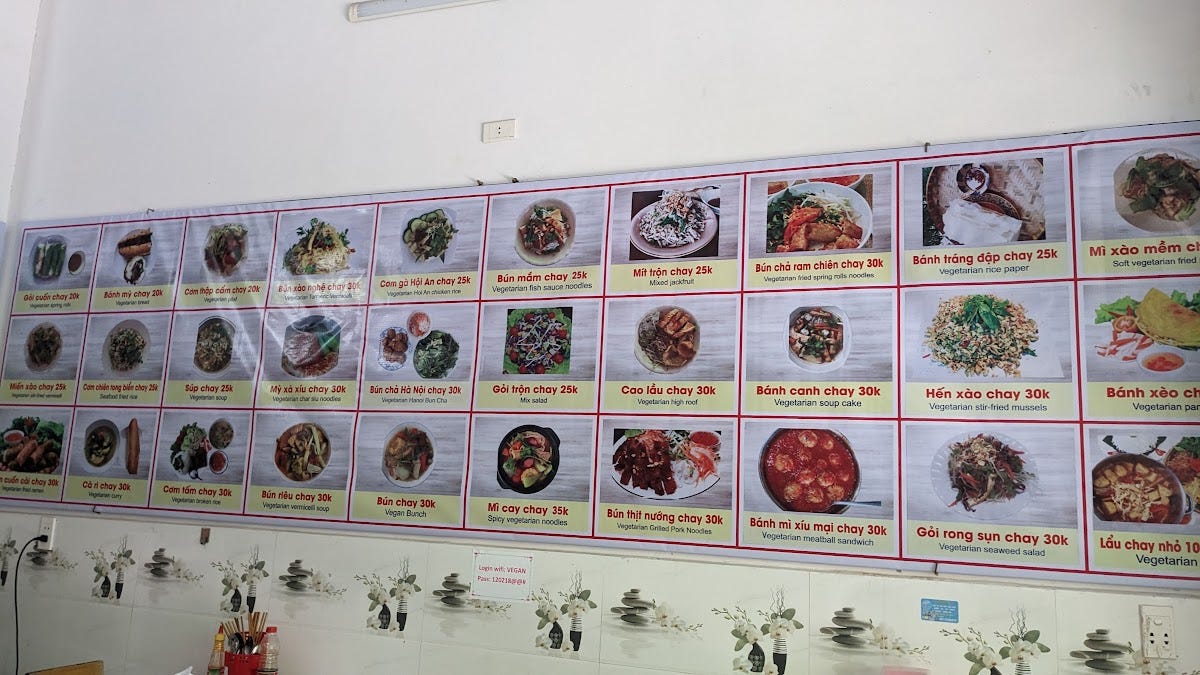 a menu wall of vegetarian Vietnamese dishes