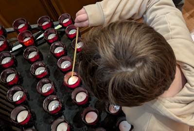 A person lighting a candle

AI-generated content may be incorrect.