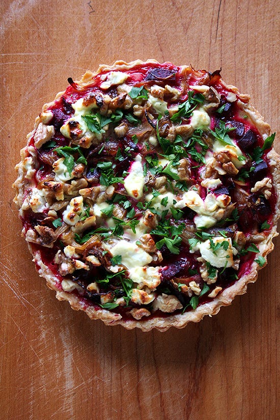 This goat cheese walnut tart is really fun. And different. And delicious. I can't promise a quick-and-easy dinner with this recipe — beets must be roasted; a tart shell must be baked — but with a little planning, assembly of this tart is quite simple. And it is so worth the effort. // alexandracooks.com