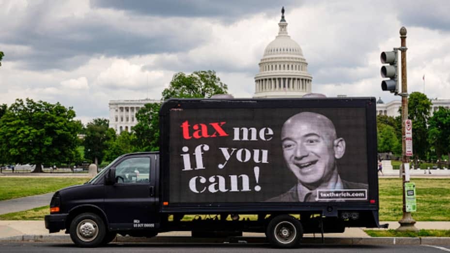 Pro-tax millionaires launching protests in front of Jeff Bezos' home