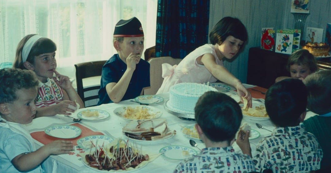 a group of people eating at a table