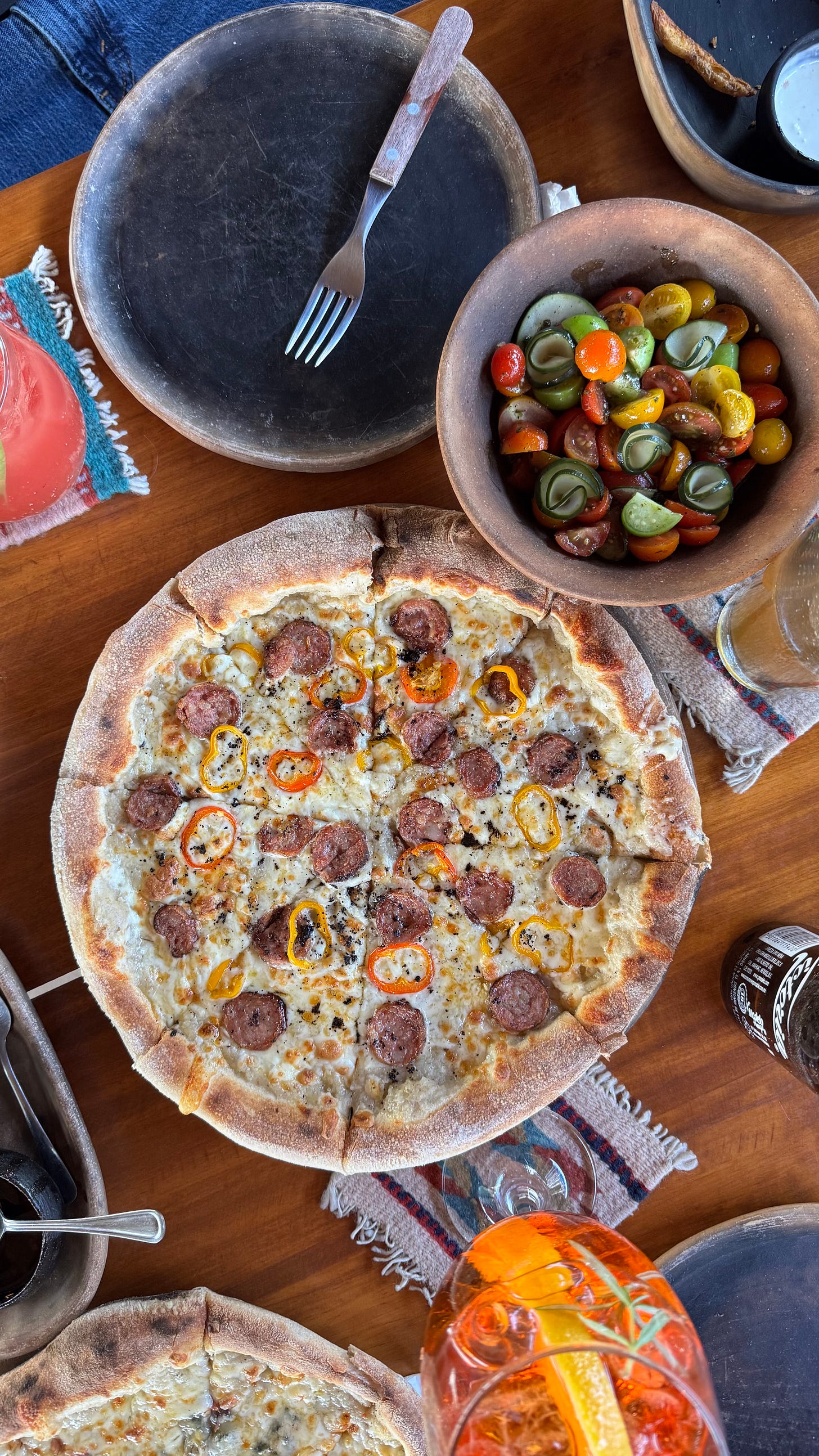 Pizza and tomato salad.