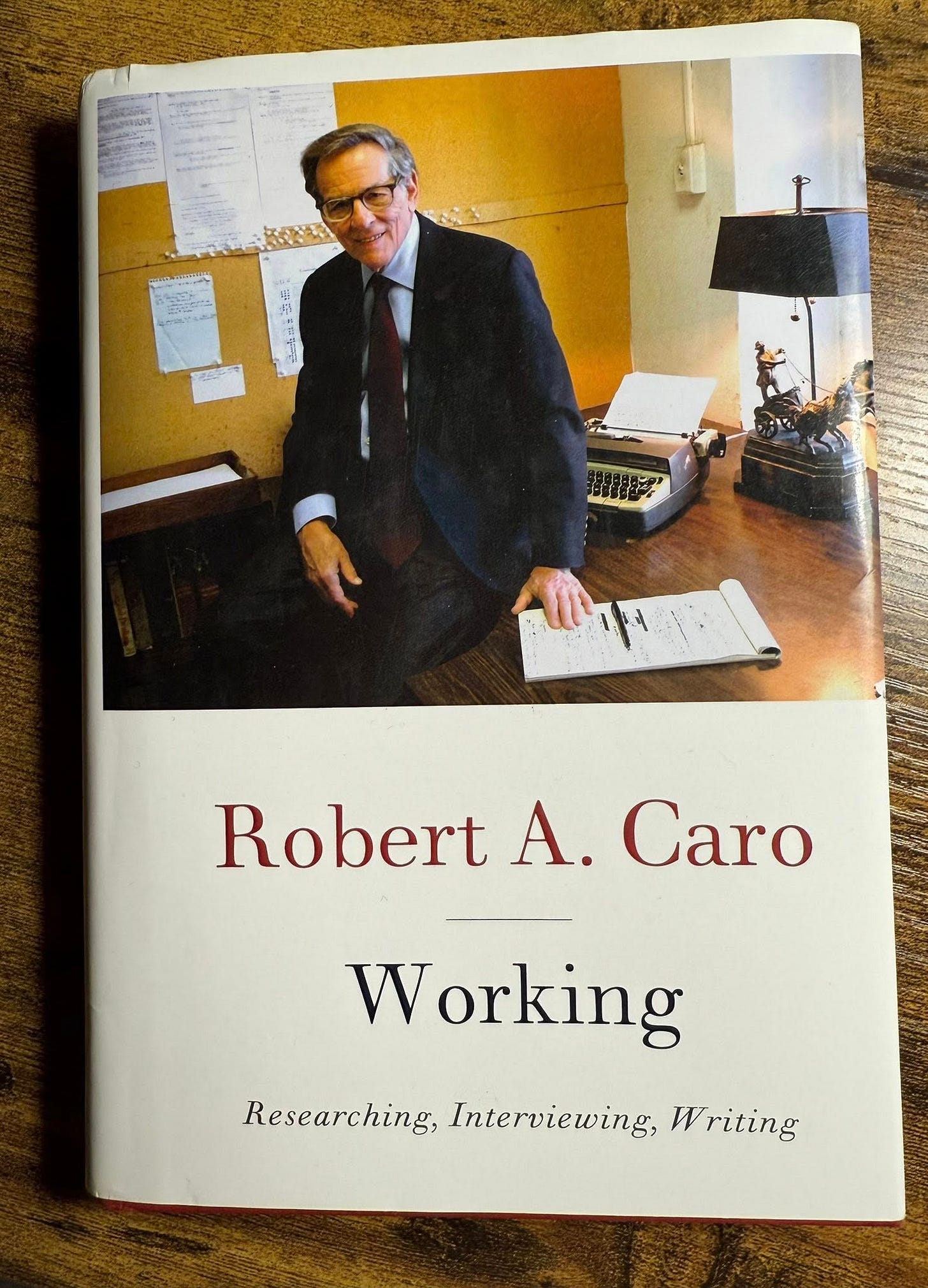 May be an image of text that says 'Robert A. Caro Working Researching, Interviewing, Writing'