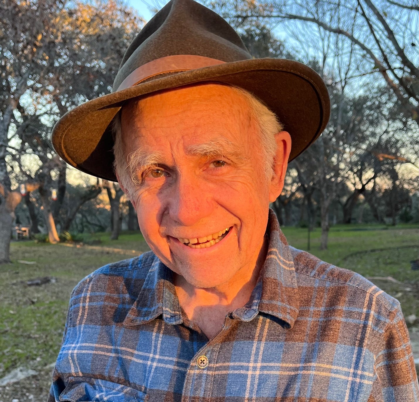 An old person wearing a hat

AI-generated content may be incorrect.