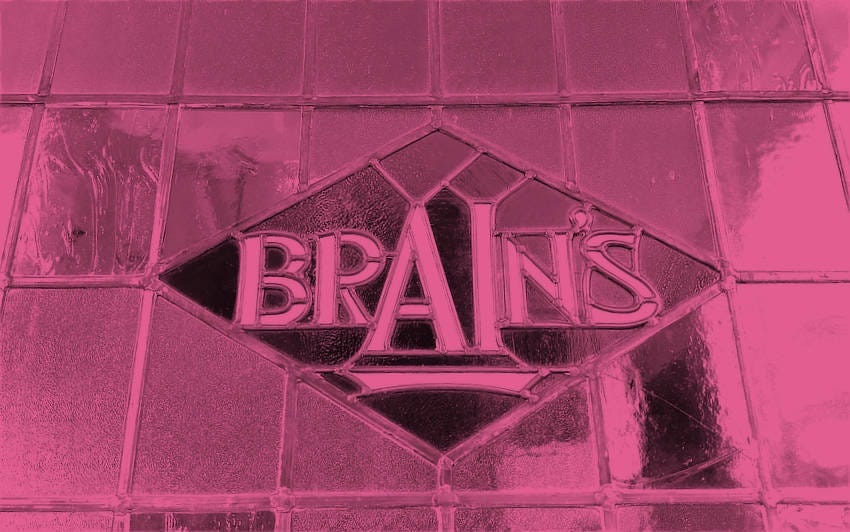 A pub window with stained glass spelling out the name of the Welsh brewery Brain's. Geddit?