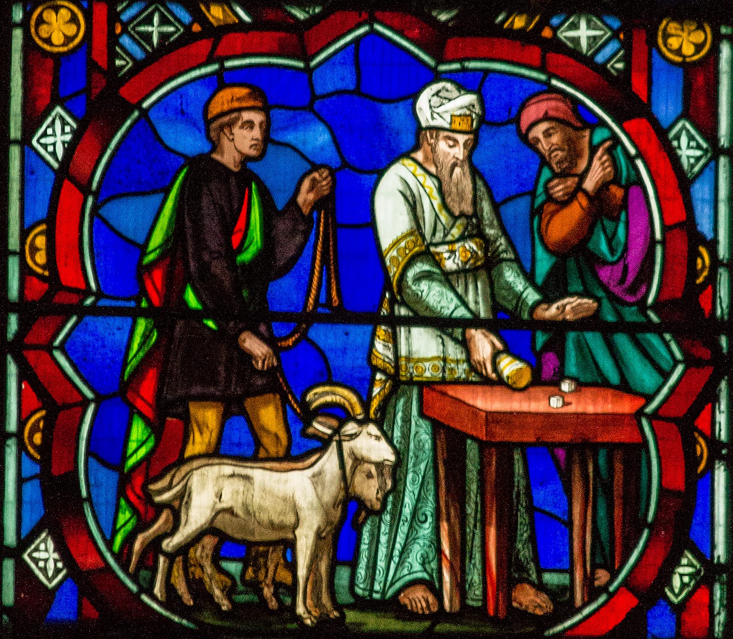 A stained glass artwork depicting the ritual of the scapegoat