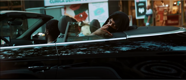 Lowkey (pictured above) has added his distinct baritone Patois to drills’ most commercially successful group OFB - a group that emerged from the Broadwater Farm area of Tottenham where many Caribbean immigrants have lived since the Windrush era. Photo from the music video for Lowkey’s single “Brush”. 