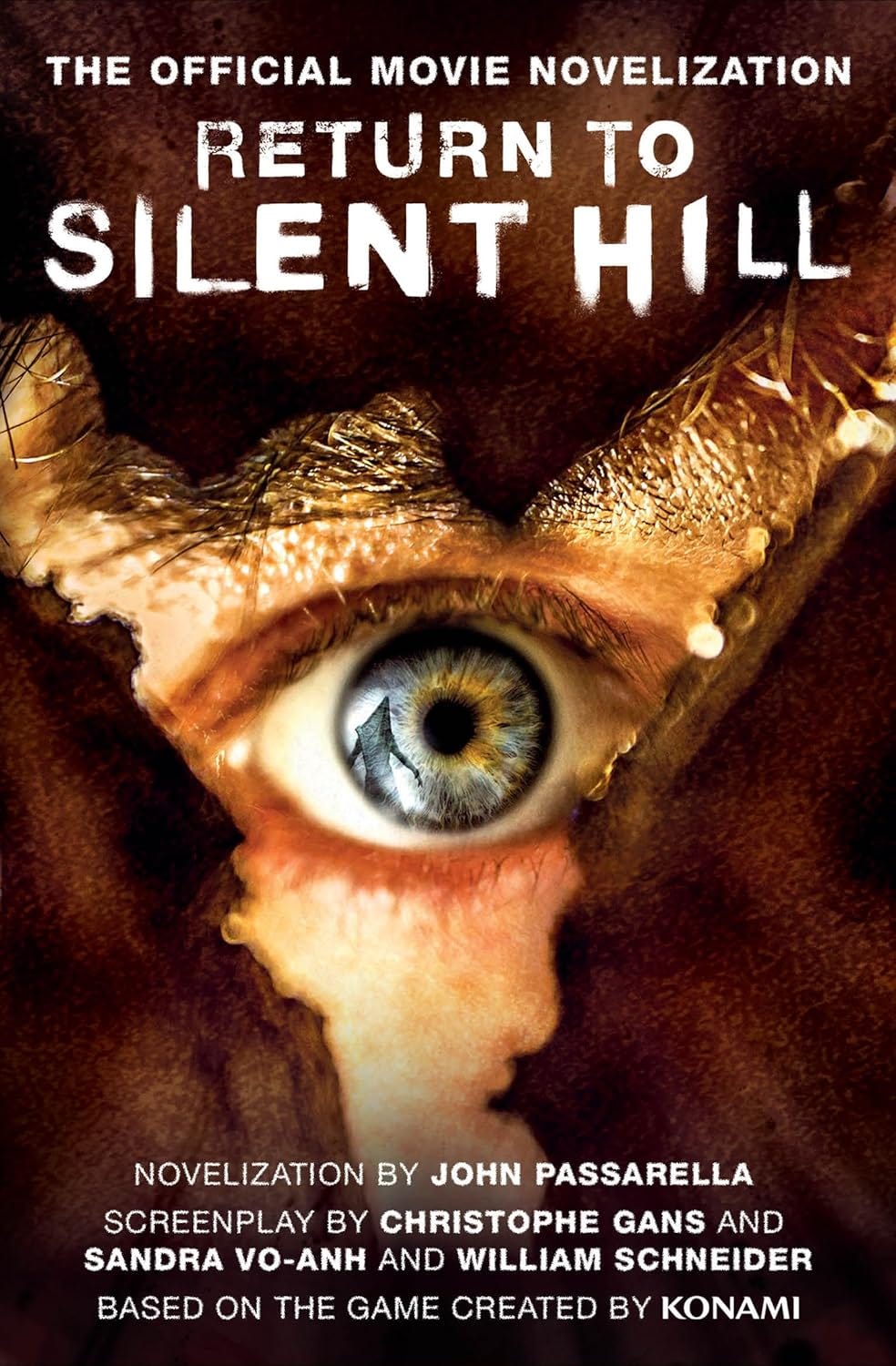 Cover of Return to Silent Hill: The Official Movie Novelization, featuring a close-up of a human eye with a figure of Pyramid Head reflected in the pupil. The surrounding skin is cracked and torn, revealing a textured, grotesque layer beneath. Text at the top reads "The Official Movie Novelization," and credits at the bottom list John Passarella as the author, and Christophe Gans, Sandra Vo-Anh, and William Schneider as screenwriters. The novel is based on the Silent Hill game series by Konami.